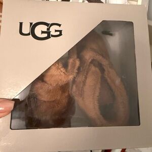 BRAND NEW. BABY UGGS. camel colour.size L